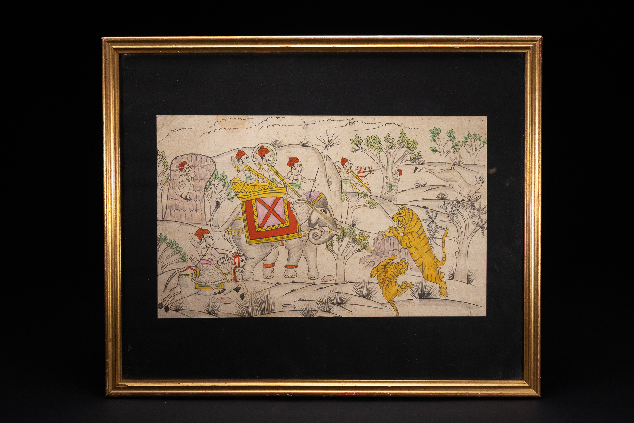 AN INDIAN RAJASTHANI SCHOOL MINIATURE PAINTING DEPICTING A ROYAL TIGER HUNT, 19TH CENTURY.
