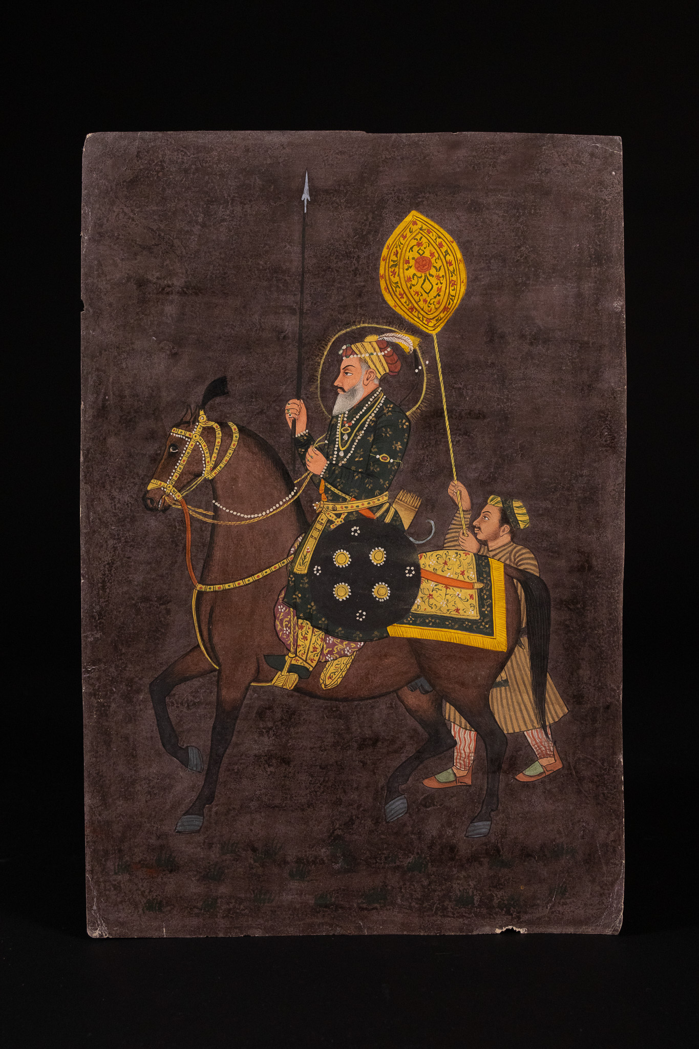 A NORTH INDIAN MINIATURE PAINTING OF A RULER ON HORSEBACK, 18TH CENTURY.