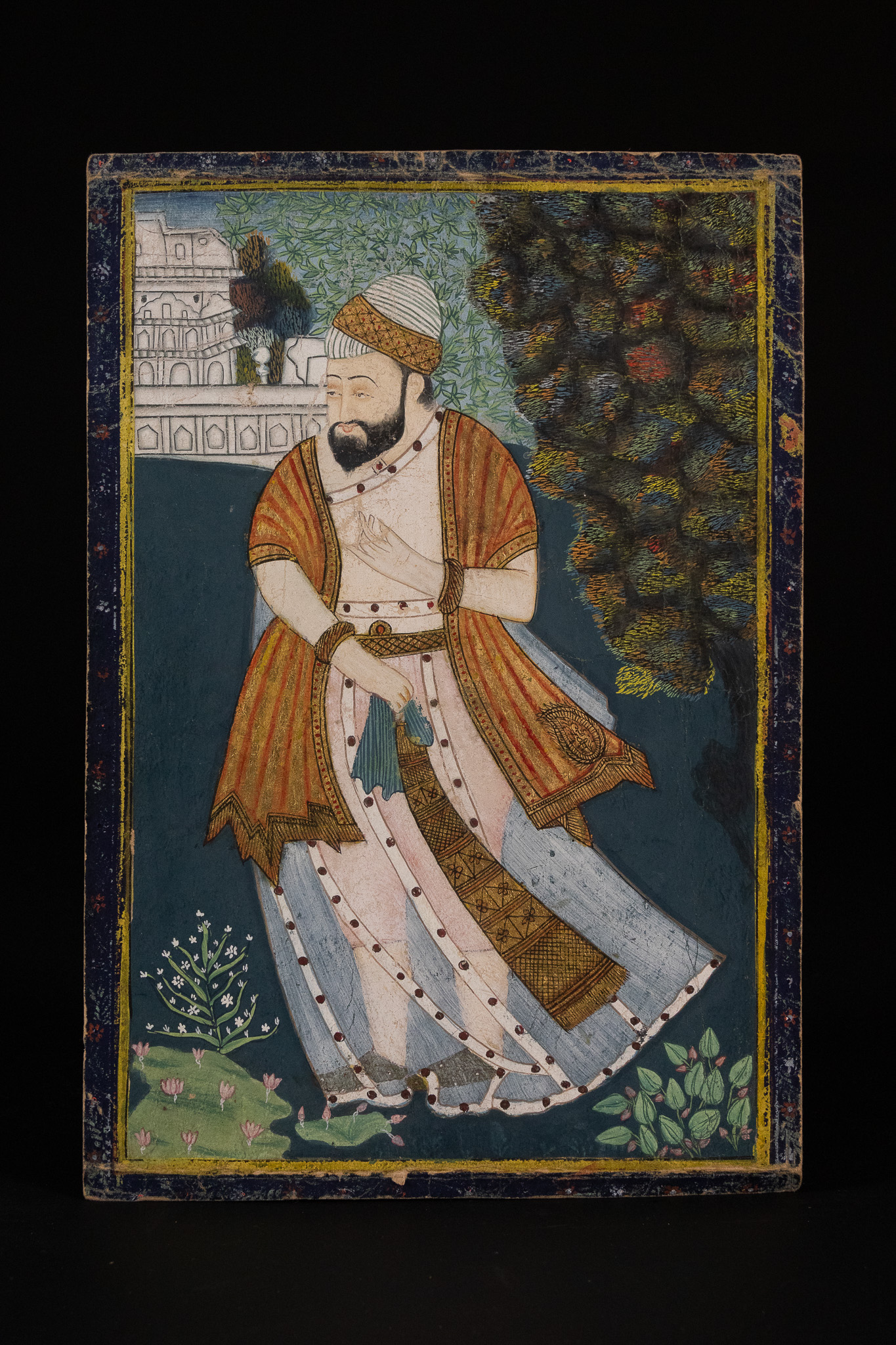 INDIAN SCHOOL, 19TH CENTURY, 'PORTRAIT OF A NOBLEMAN STANDING IN A LANDSCAPE'.