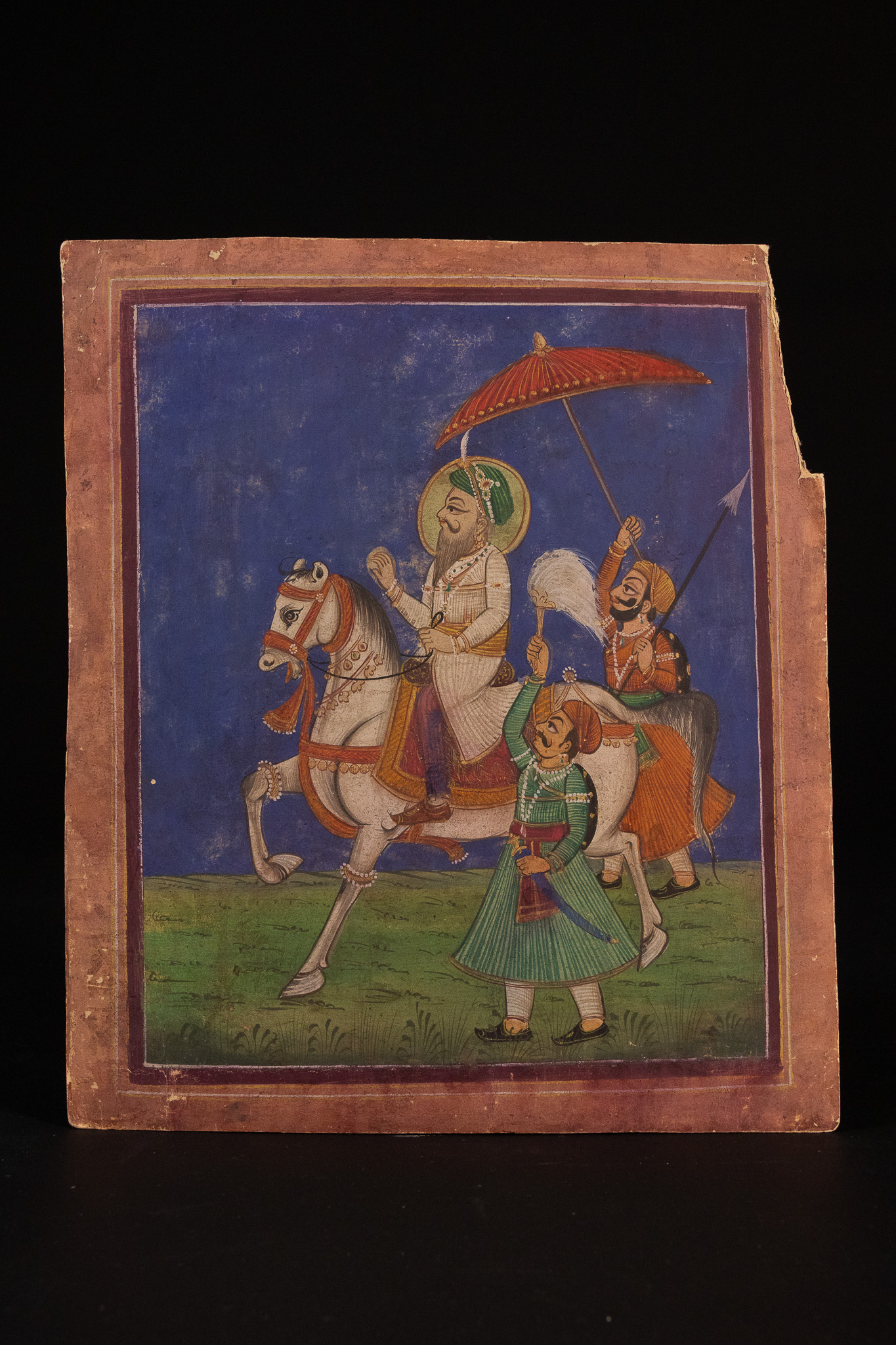PUNJAB SCHOOL, 19TH CENTURY, 'AN EQUESTRIAN PORTRAIT OF A SIKH RULER'.