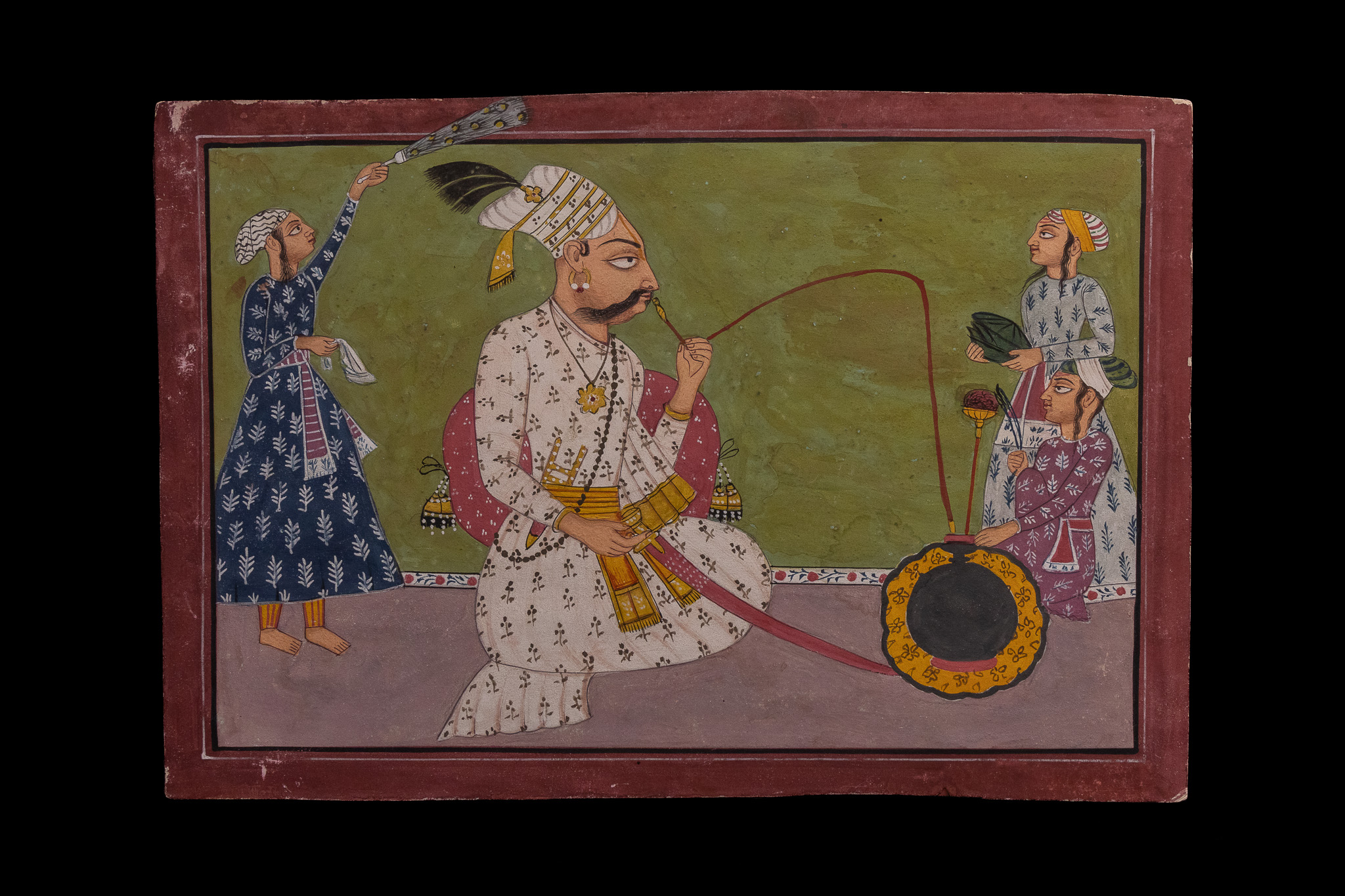 PAHARI OR BASOHLI SCHOOL, 18TH CENTURY, A RULER SMOKING A HOOKAH WITH ATTENDANTS.