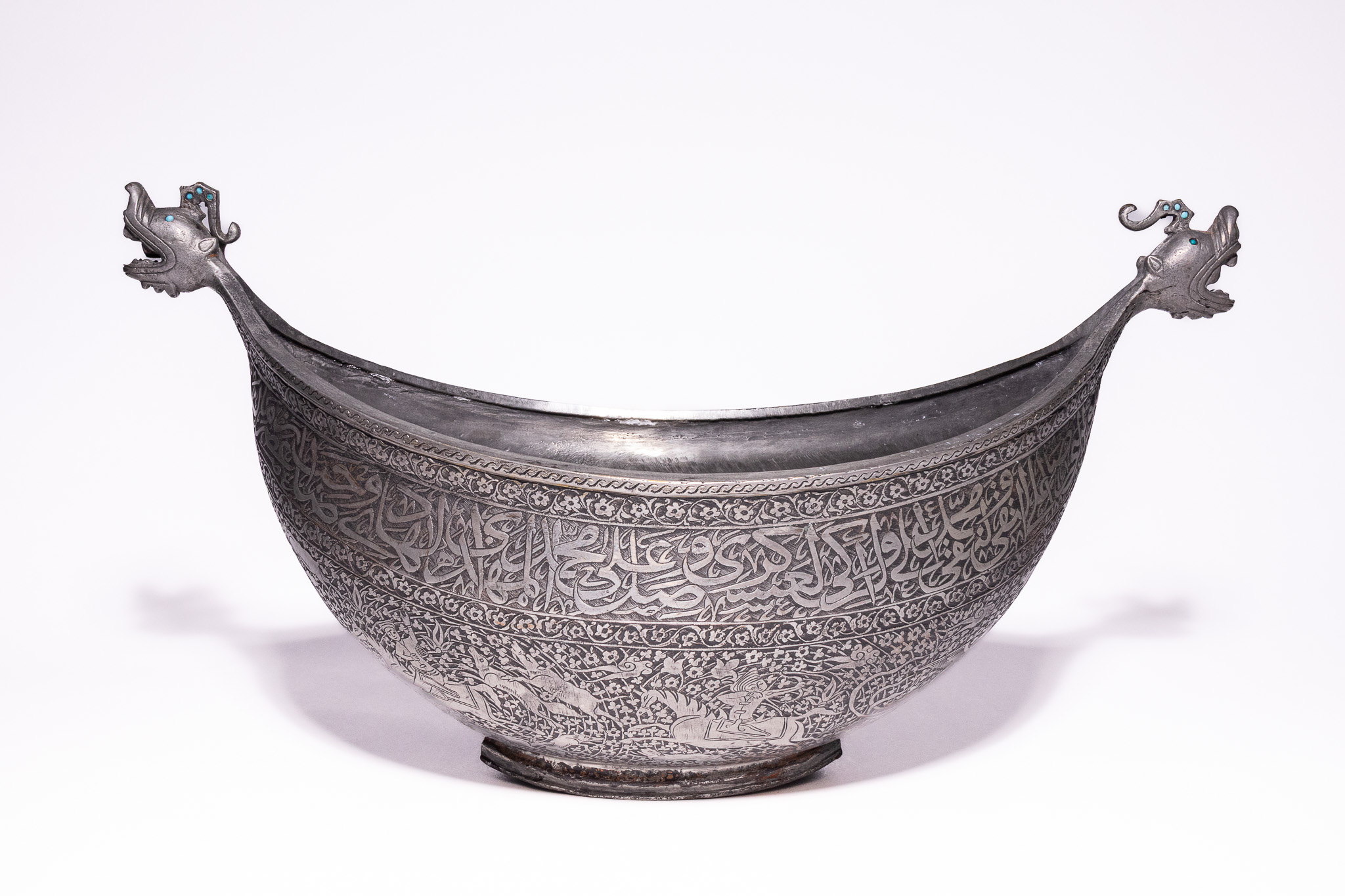 A SAFAIVD TINNED COPPER KASHKUL, 17TH CENTURY.