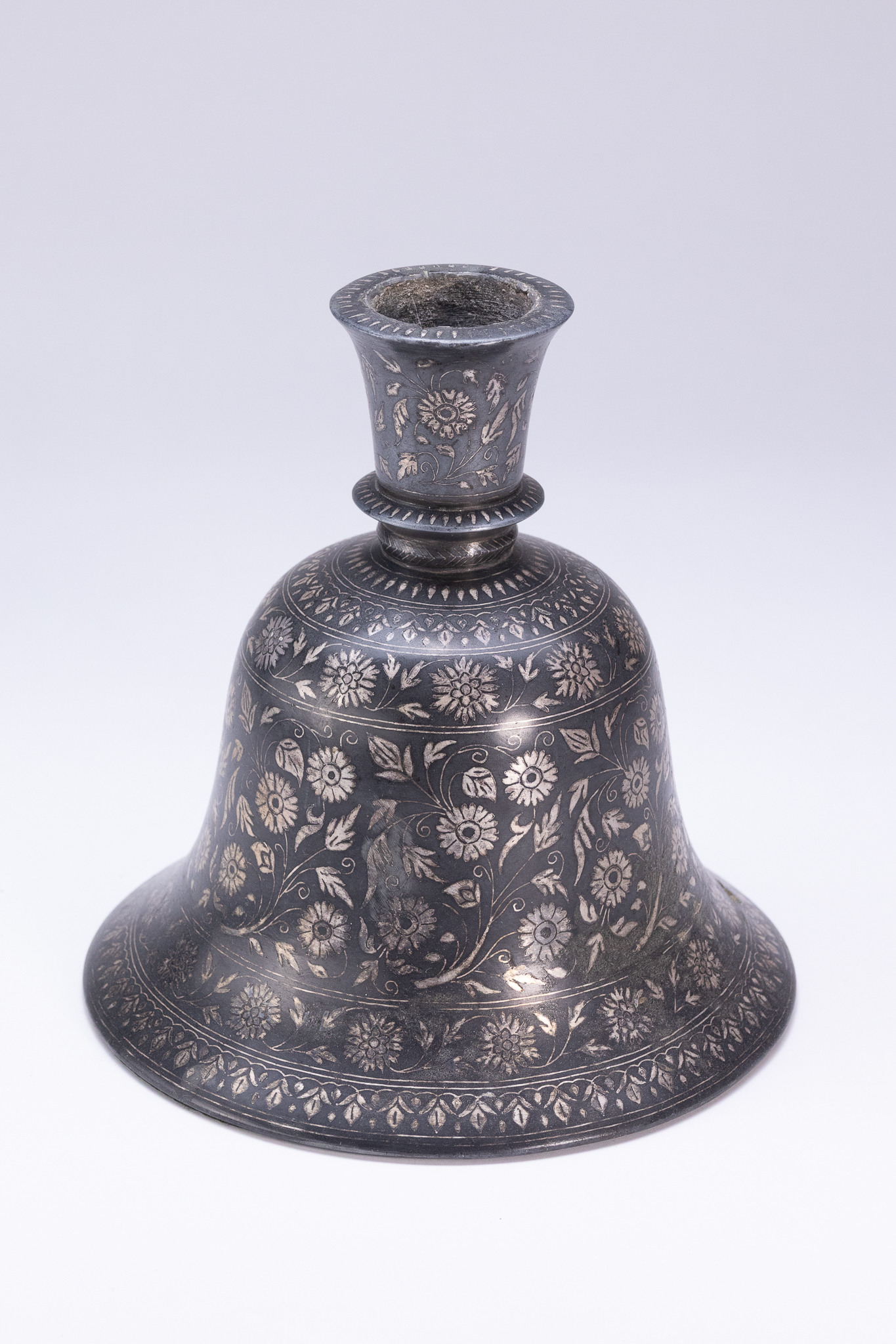 AN INDIAN BIDRIWARE SILVER INLAID BELL SHAPED HOOKAH BASE, 19TH CENTURY.
