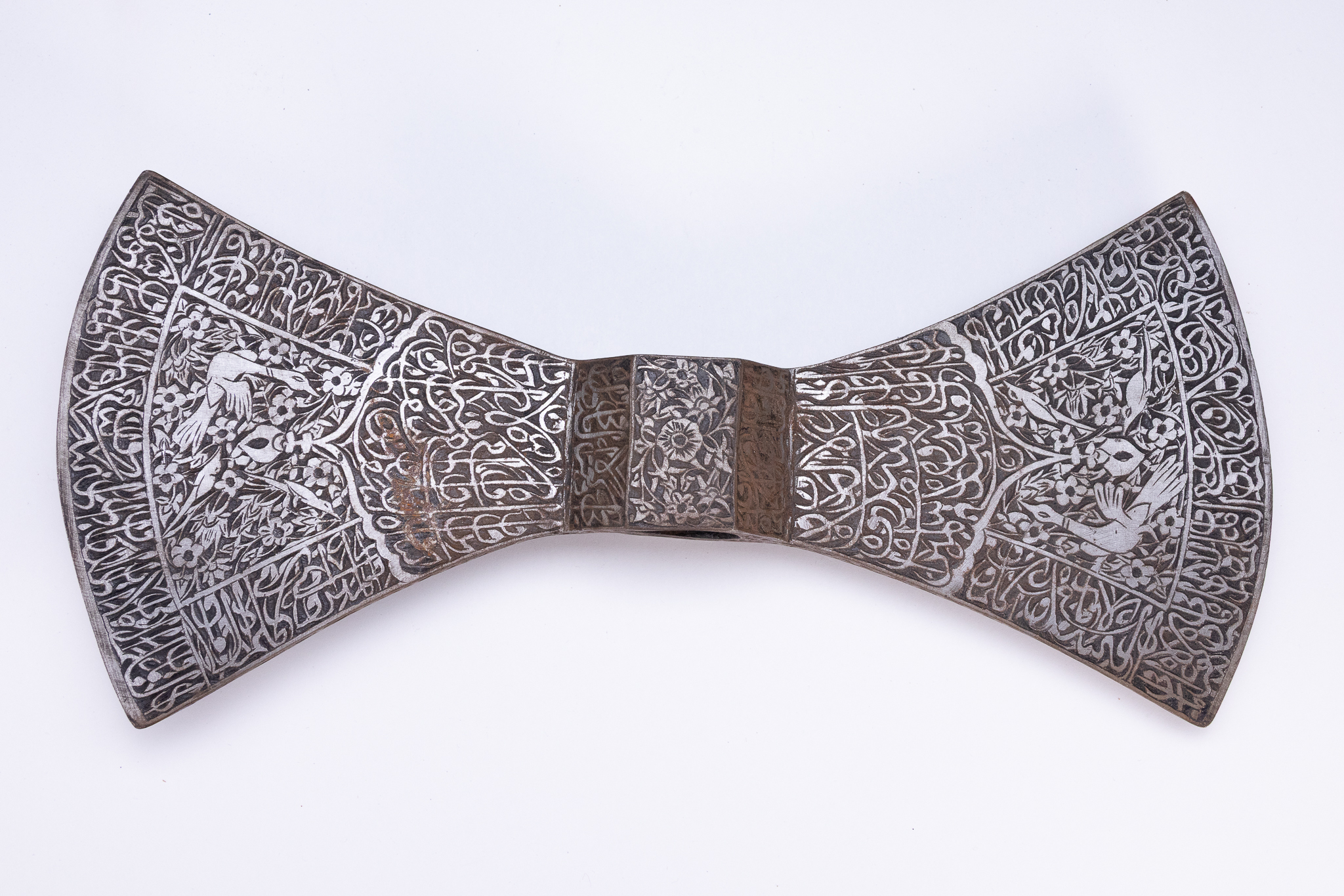 AN INDO-PERSIAN STEEL DOUBLE-HEADED AXE HEAD TABARZIN.