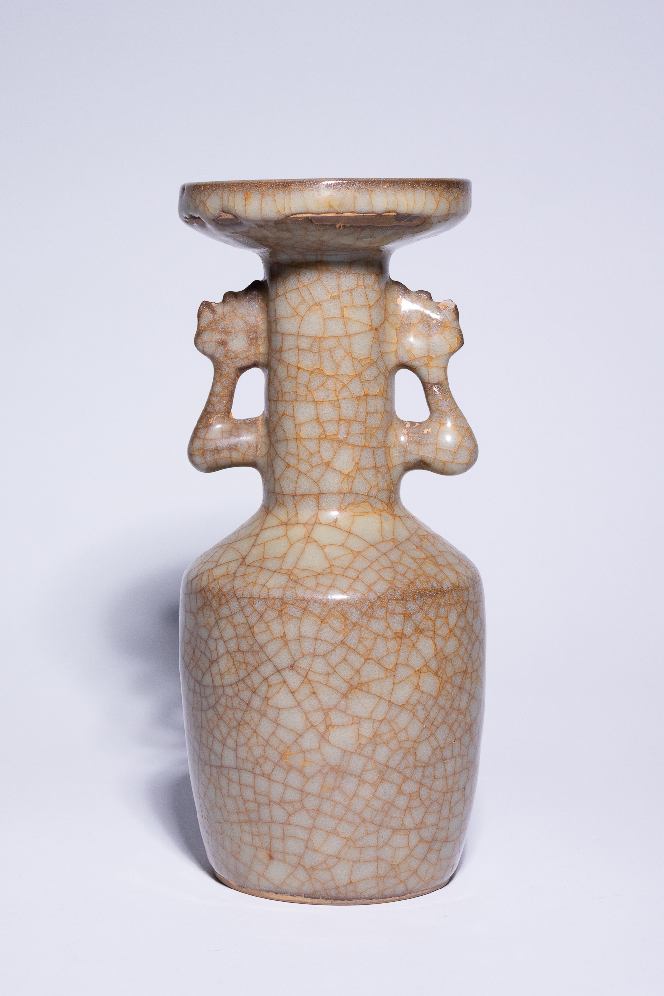 A CHINESE GE-TYPE CRACKLE-GLAZED DISH-MOUTH VASE WITH ANIMAL-HEAD HANDLES.