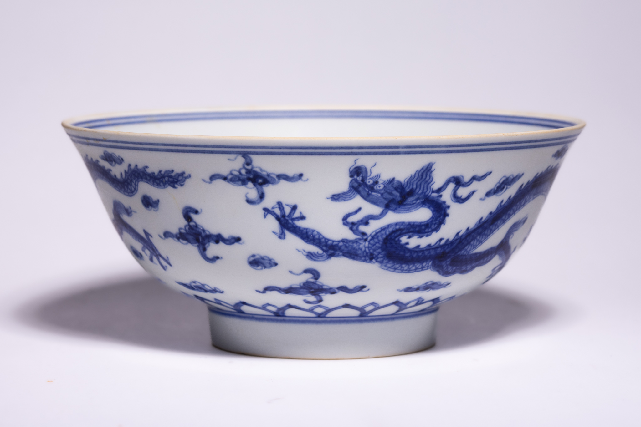 A CHINESE BLUE AND WHITE PORCELAIN DRAGON BOWL, CHENGHUA MARK.