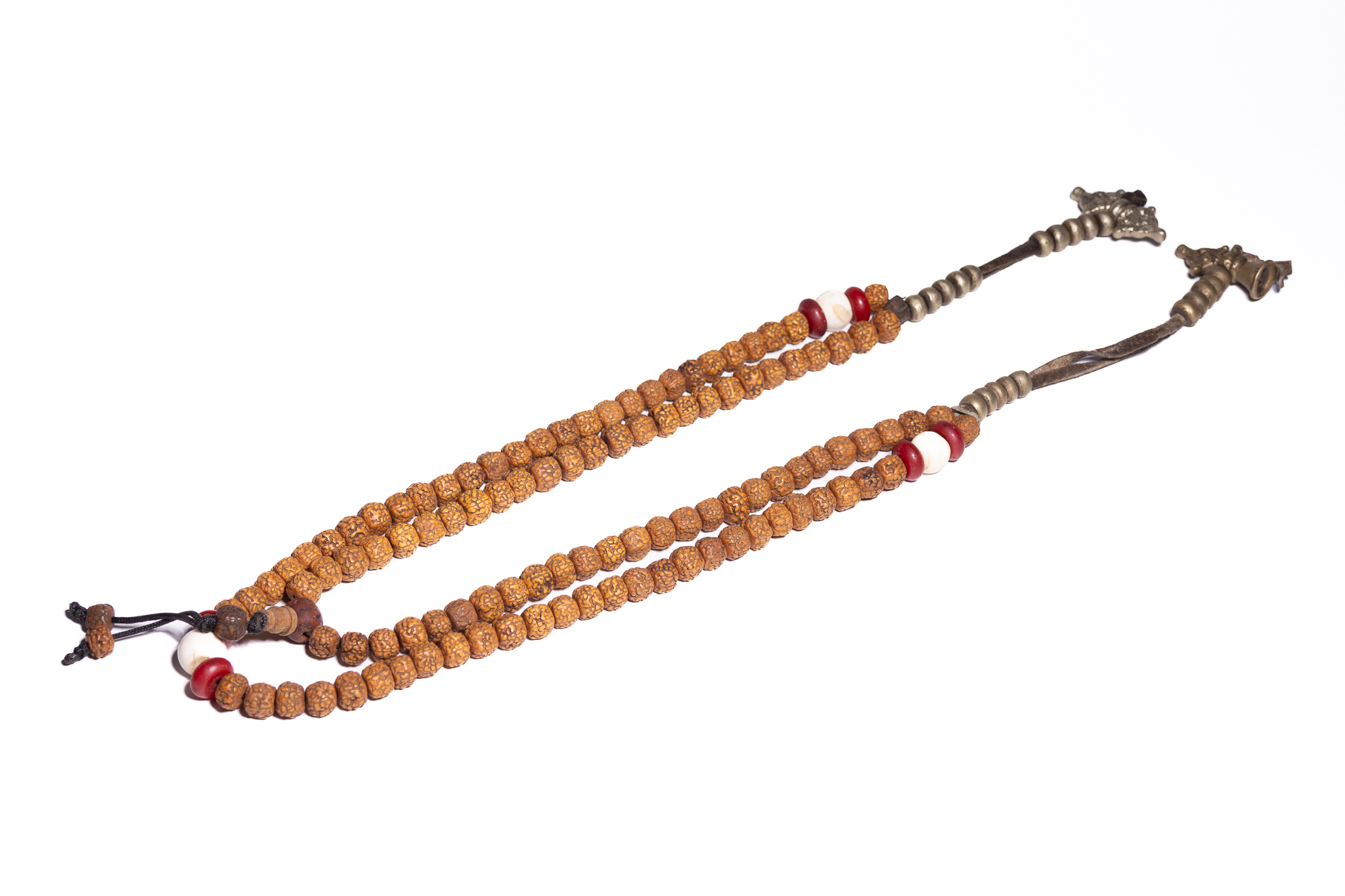 A TIBETAN BUDDHIST MALA WITH METAL VAJRA AND BELL COUNTERS.