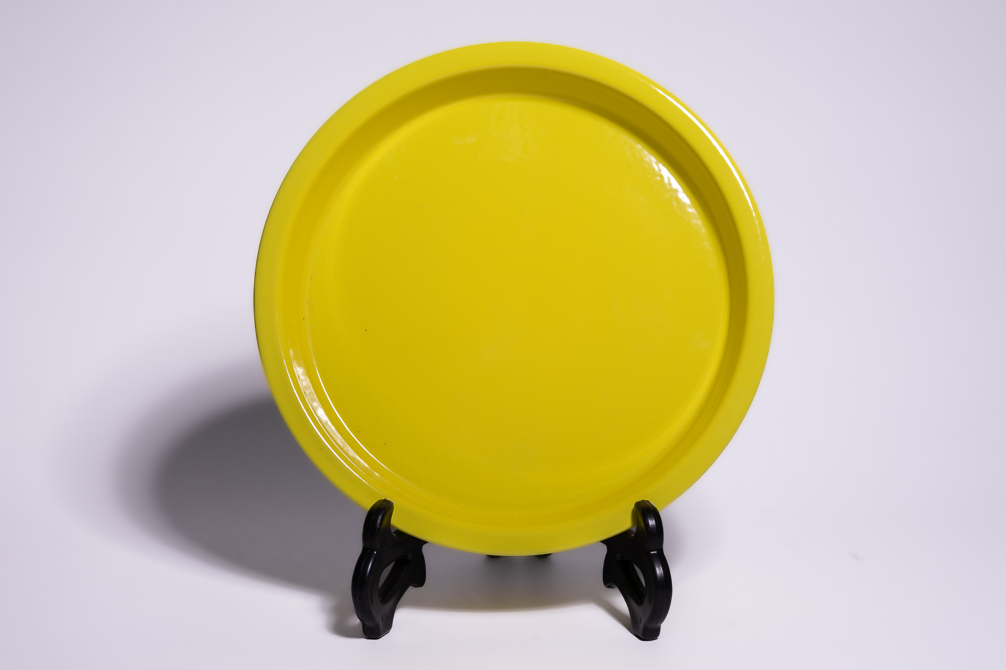 A CHINESE MONOCHROME YELLOW-GLAZED PORCELAIN DISH, YONGZHENG MARK.