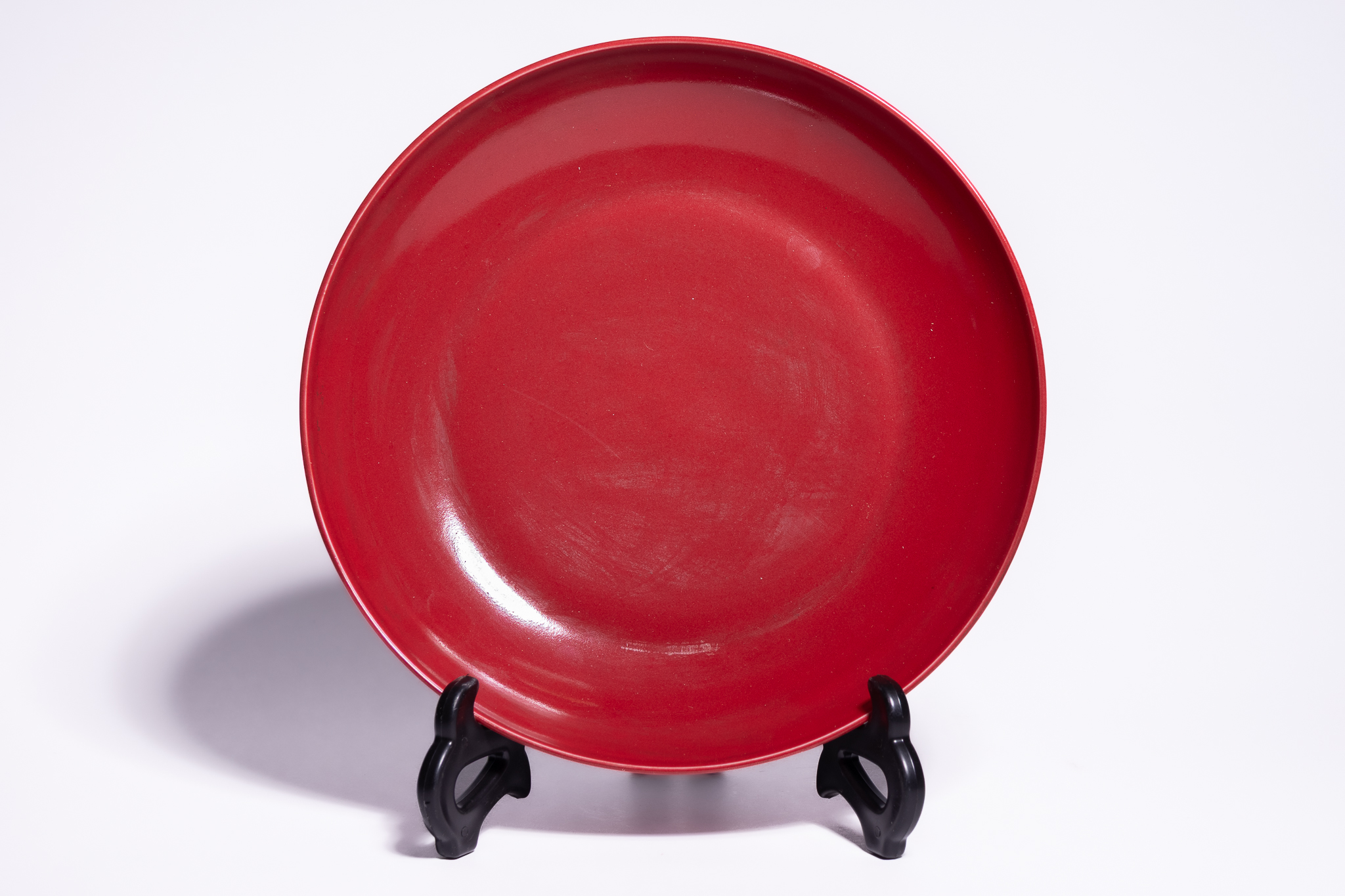 A CHINESE MONOCHROME COPPER-RED GLAZED PORCELAIN DISH, YONGZHENG MARK.