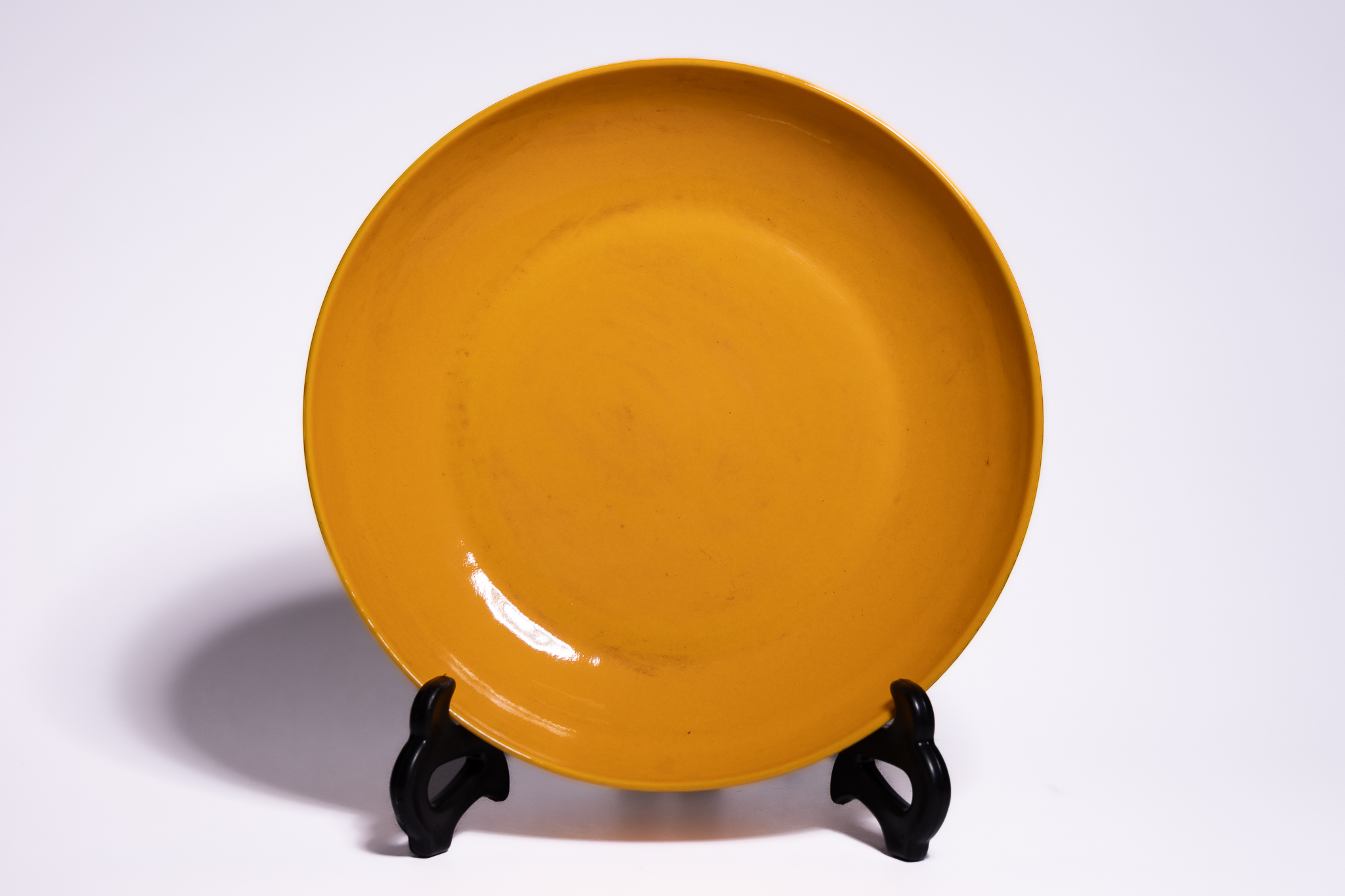 A CHINESE IMPERIAL YELLOW-GLAZED PORCELAIN DISH, YONGZHENG MARK.