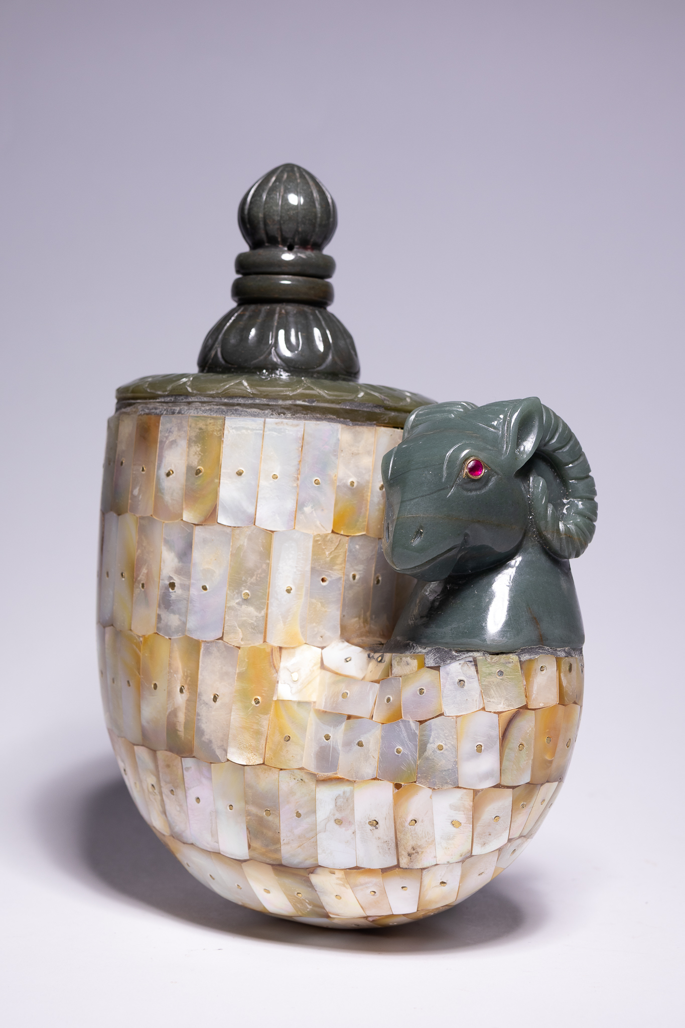 AN INDIAN MUGHAL STYLE MOTHER-OF-PEARL AND JADE FLASK WITH RAM FINIAL.