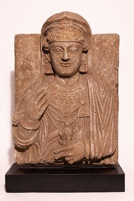 A PALMYRENE STYLE TERRACOTTA FUNERARY RELIEF BUST OF A NOBLEWOMAN, POSSIBLY CIRCA 2ND - 3RD 
