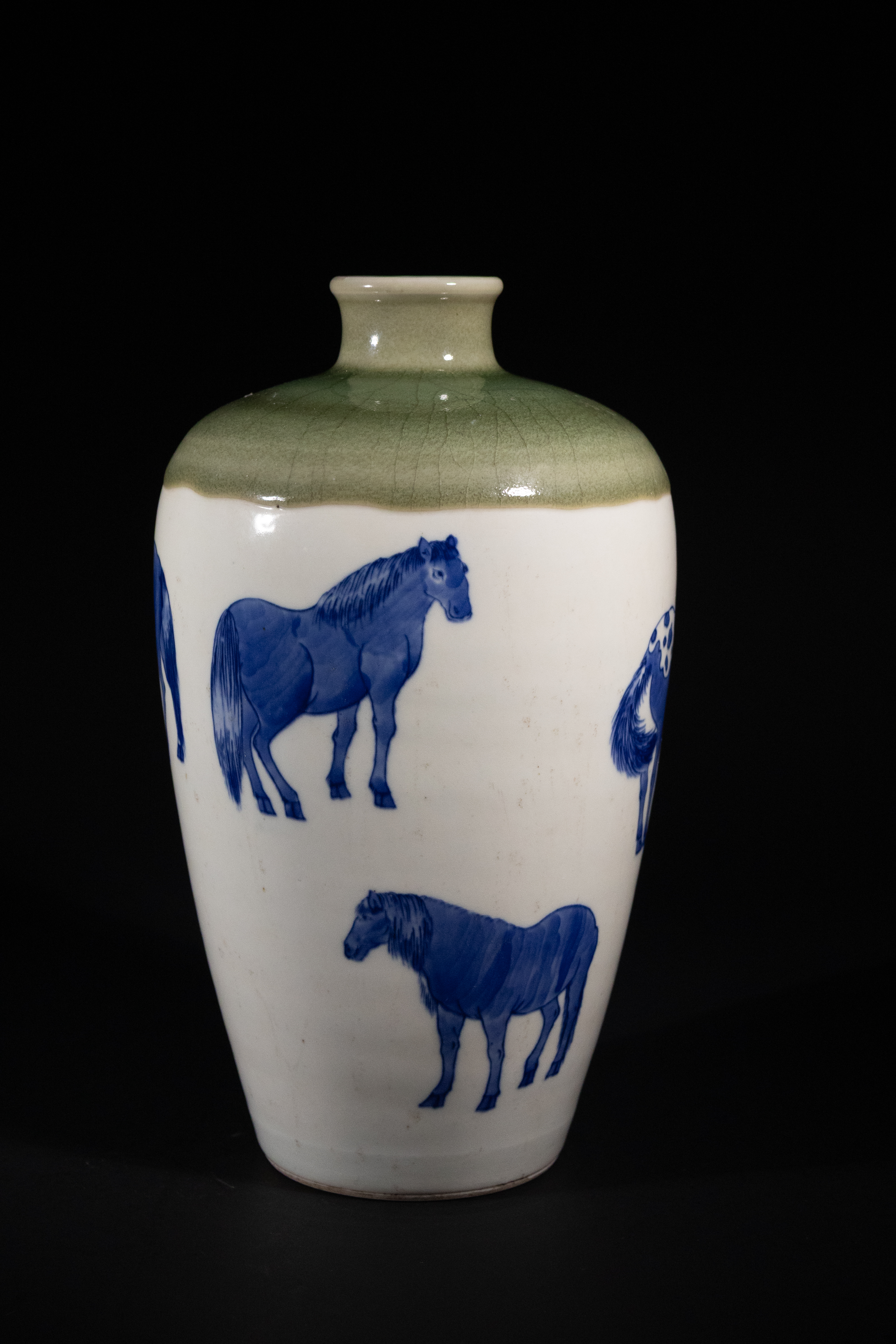 A Chinese Blue and White Celadon Glazed 'Eight Horses' Vase, Kangxi Style