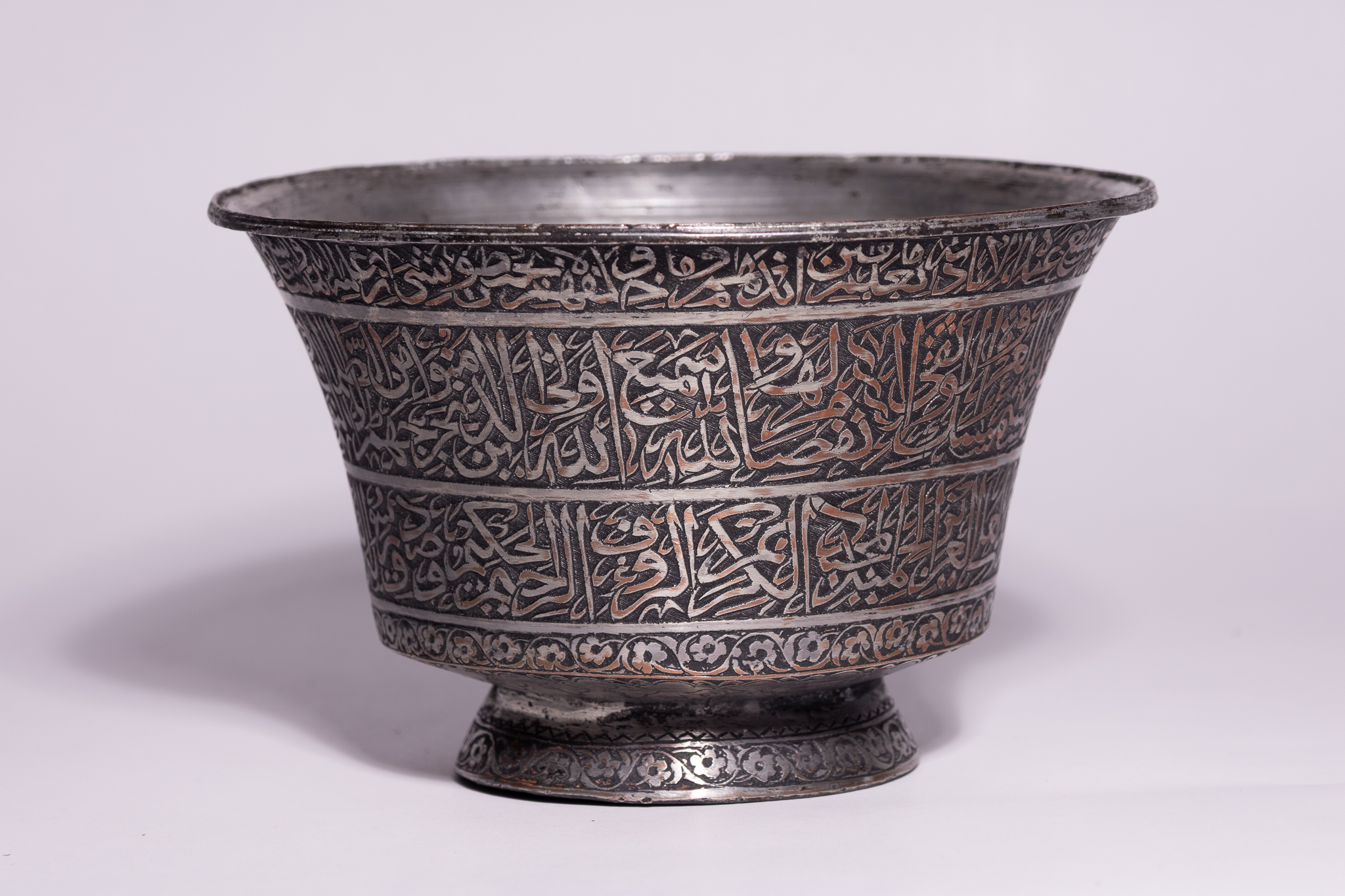 A PERSIAN TINNED COPPER CALLIGRAPHY BOWL, 19TH CENTURY.