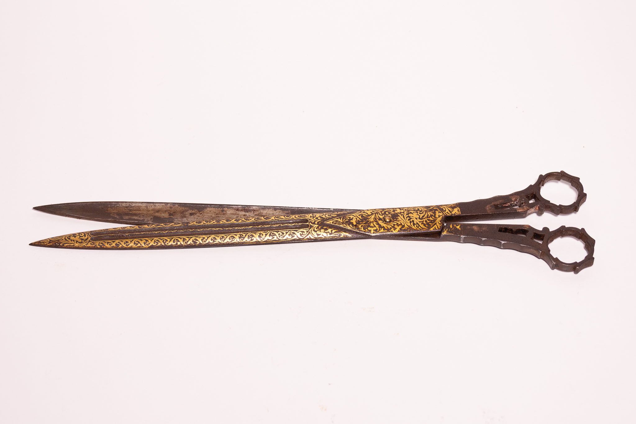 AN OTTOMAN GOLD-DAMASCENED STEEL CALLIGRAPHER'S SCISSORS.