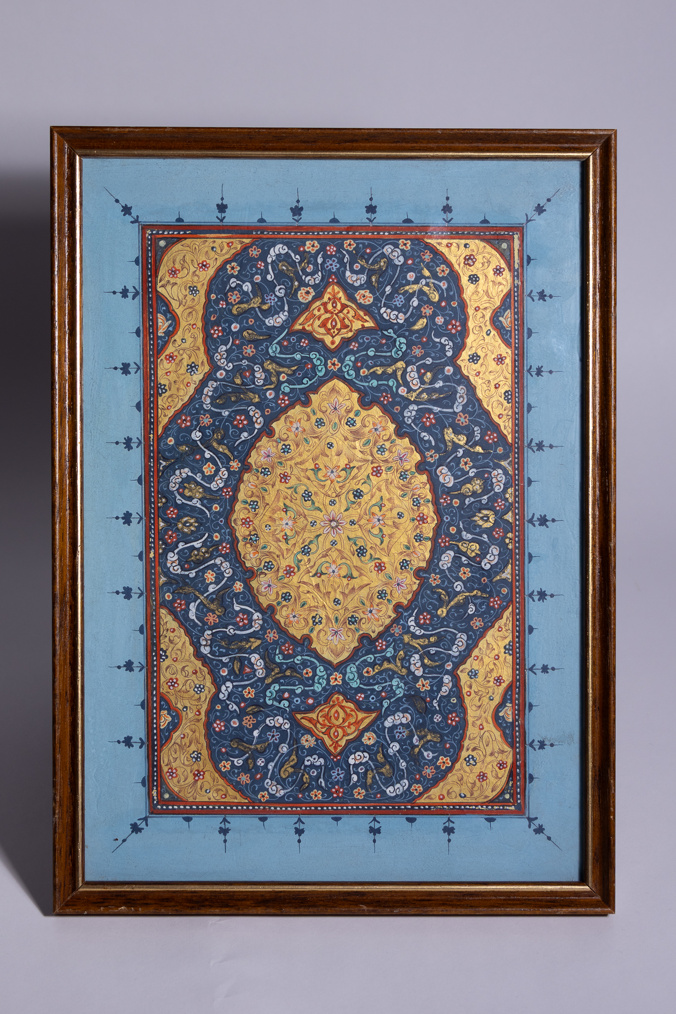 A FRAMED ILLUMINATED MANUSCRIPT FRONTISPIECE IN THE SAFAVID STYLE.
