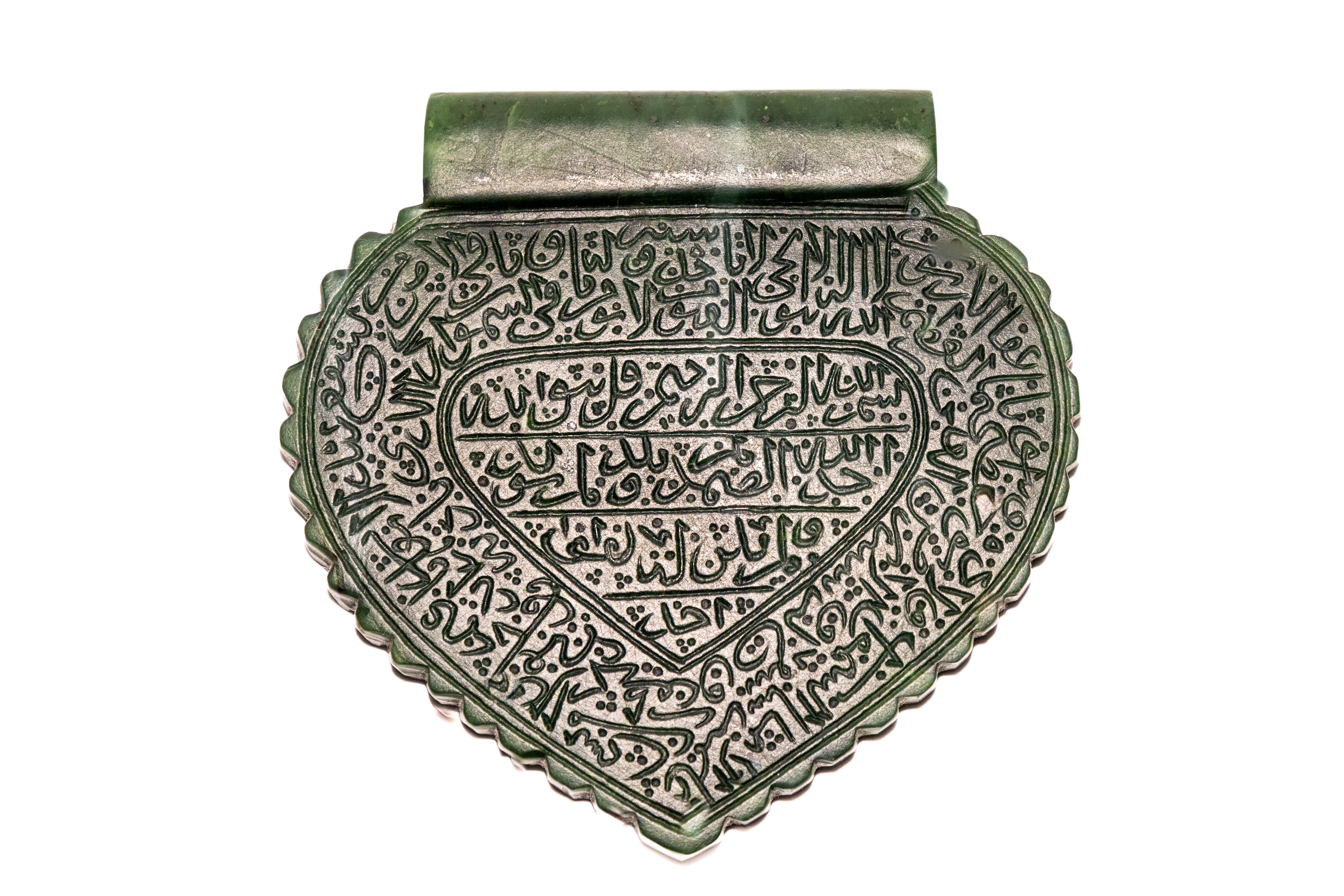 A MUGHAL-STYLE INSCRIBED JADE TALISMANIC PENDANT.