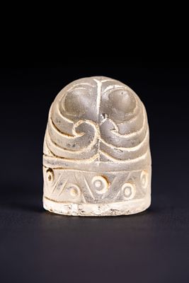 A FATIMID STYLE CARVED ROCK CRYSTAL CHESS PIECE. An early Islamic style carved rock crystal 