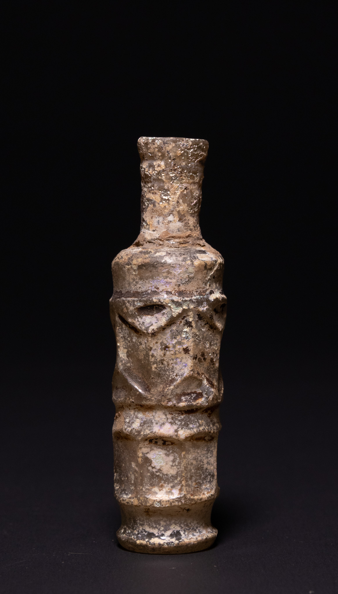 A SASSANIAN CUT-GLASS FIGURAL VESSEL, CIRCA 5TH–7TH CENTURY A.D.
