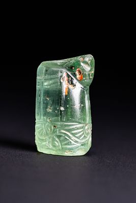 A FATIMID GREEN AQUAMARINE CHESS PIECE, CIRCA 10TH–12TH CENTURY AD. A substantial Fatimid 