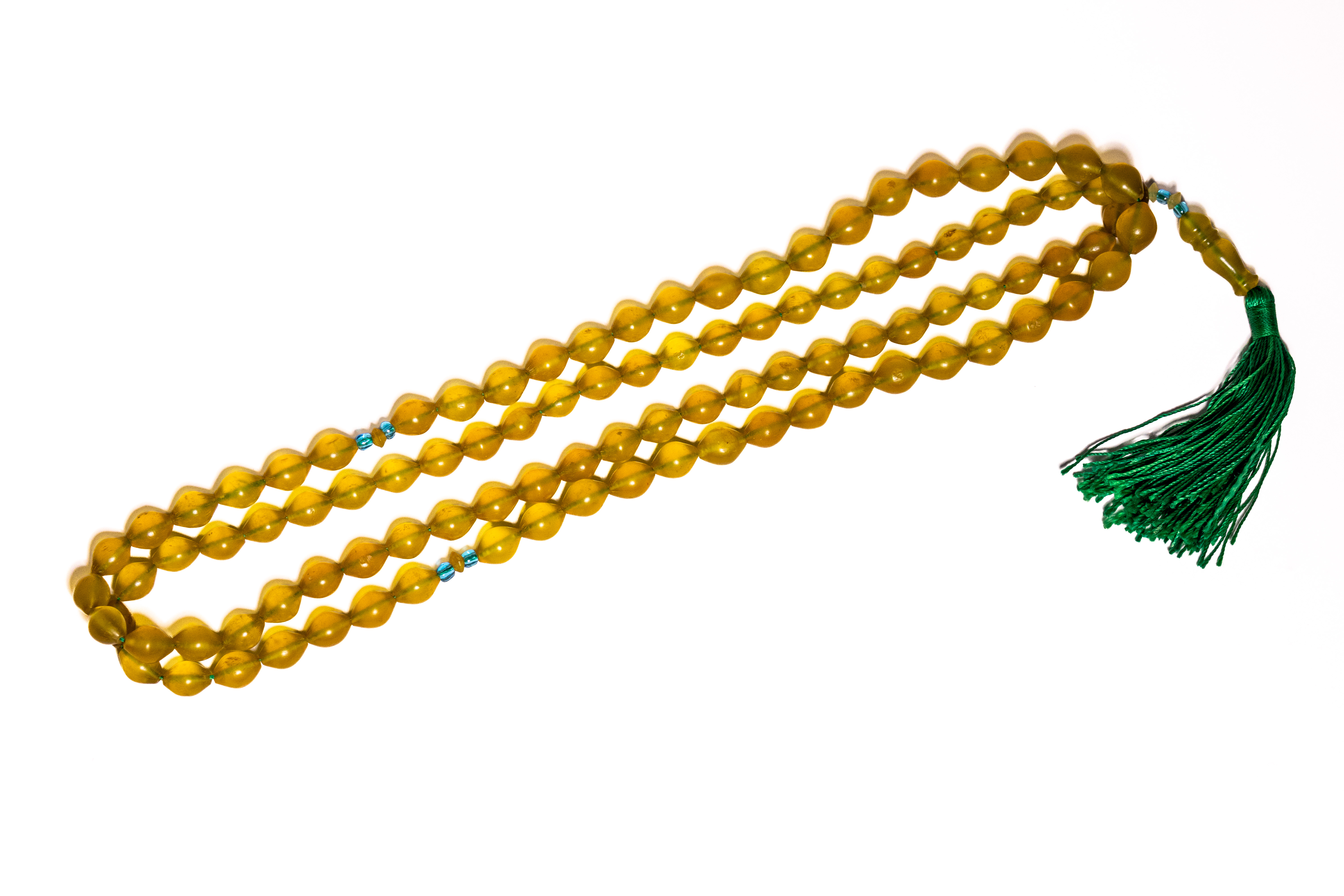 AN ISLAMIC SHAH MAQSOUD YELLOW STONE 99-BEAD MISBAHA PRAYER BEADS.