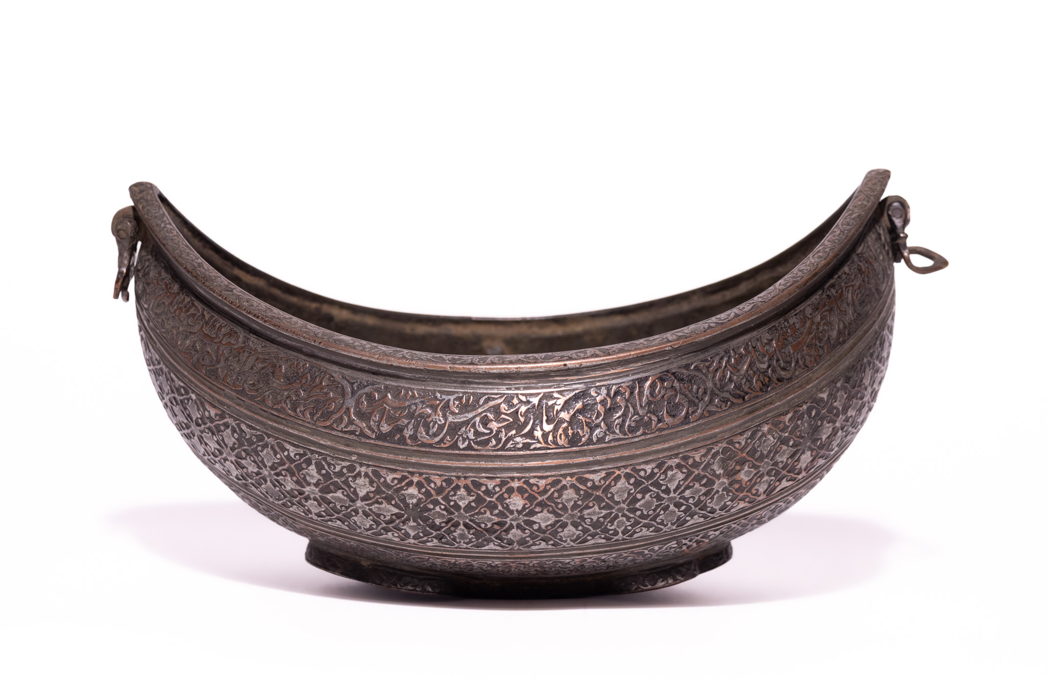 A SAFAVID TINNED COPPER KASHKUL BEGGARS BOWL, 17TH CENTURY.