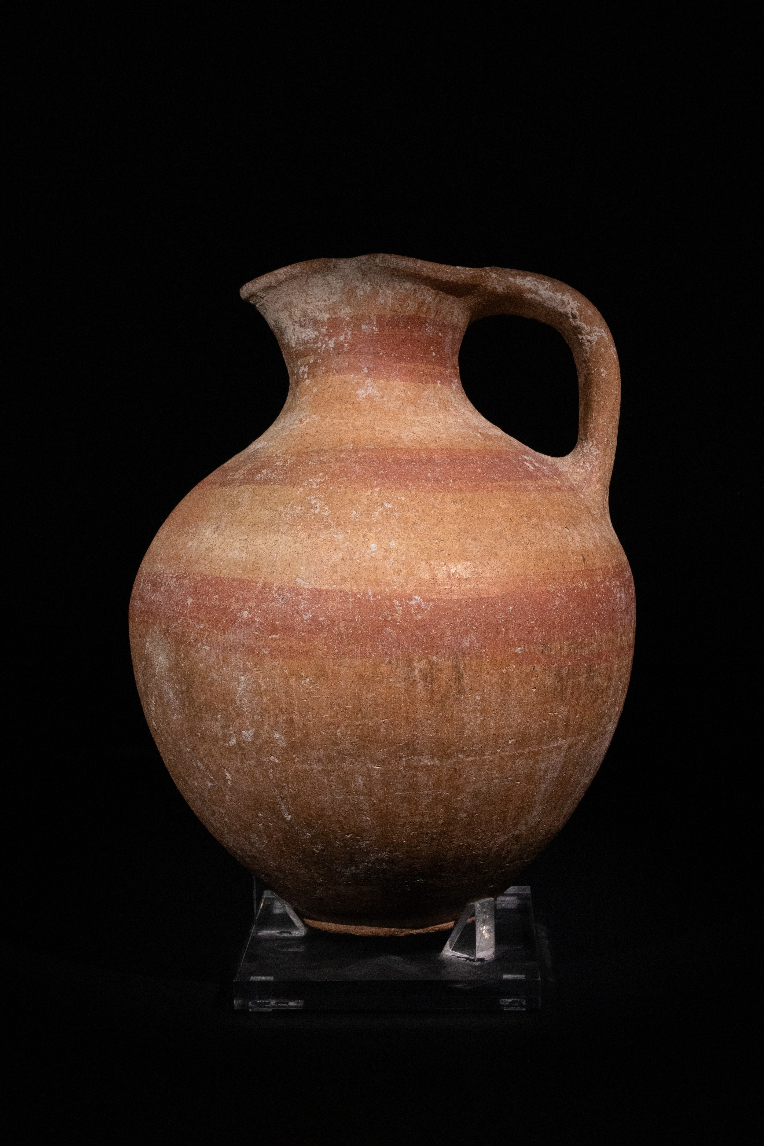 AN EASTERN GREEK TERRACOTTA JUG, 4TH-5TH CENTURY B.C., WITH TREFOIL SHAPED SPROUT.