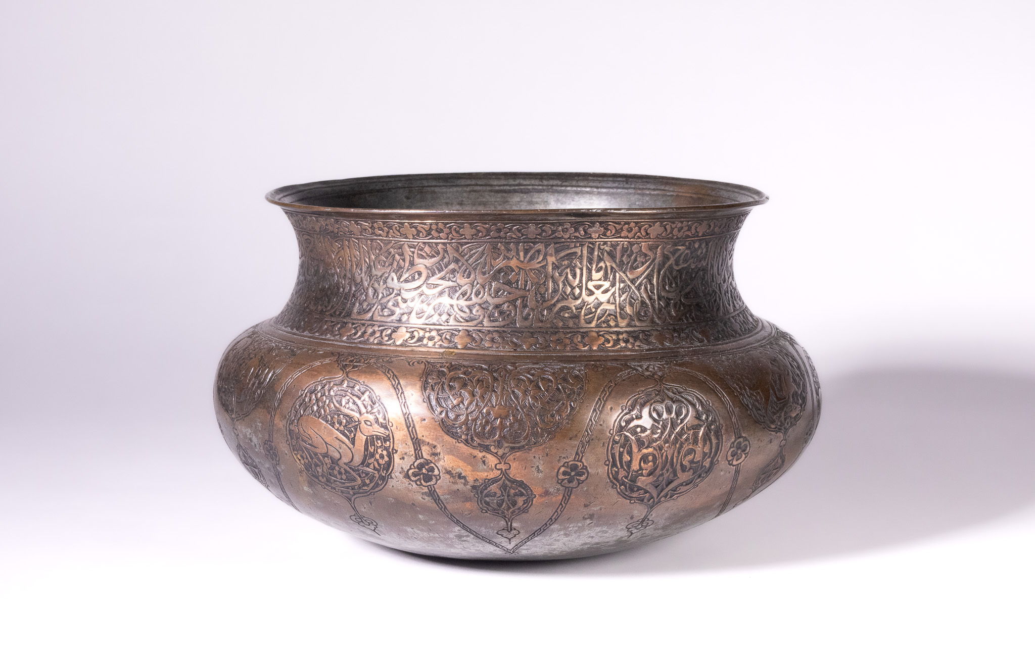 A SAFAVID TINNED COPPER GLOBULAR BOWL, 17TH CENTURY.