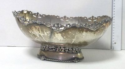 Silver 900 oval bowl with relief. 769 gm, 30X19X12 cm