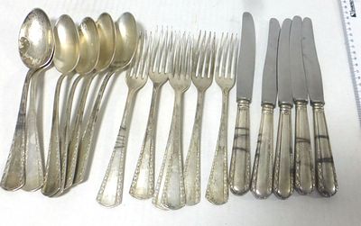 Partial silver 800 cuttlery. includes spoon and fork (6), appr 674 gm, and 5 knives, handles 
