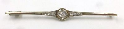 Long pin, 14K gold. set with diamonds, 10 pts (1), 1-2 pts (6), 2.7 gm