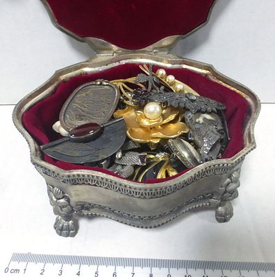 Jewelry box with music mechanism. with 21 pins, 7 silver, 2 bone, 2 jade and ten more