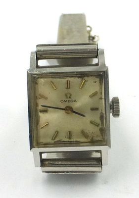 Woman's wrist watch by Omega. mechanism in working order, stainless steele box, bracelet only 