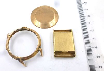 Two watch cases, 14K gold. 16.3 gm