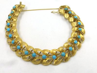 14K gold bracelet, set with 21 turquoise. beads, 20 gm