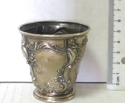 Small silver cup with relief craft. was tested for silver, 51 gm