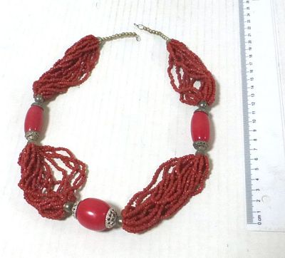 Necklace with red coral- like beads. length 65 cm
