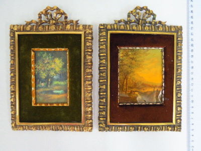 Pair of decorated brass frames, each with hand drawing