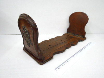 Carved oak book holding device, Florentine style