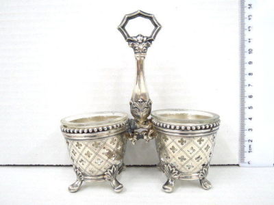 Silver plated saltcellar with small glass bowls inside