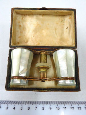 Brass opera glass with mother of pear coating, in leather covered case