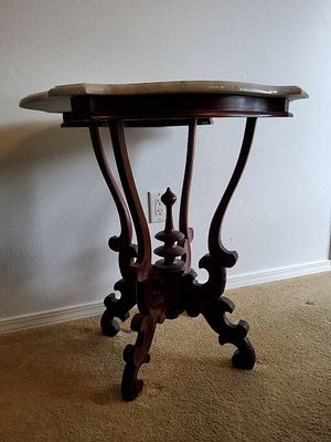 Ornate Wood and Marble-Top Accent Table. Accent table of Victorian style featuring a scalloped 
