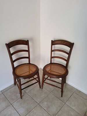 Pair of Wooden Ladder Back Chairs with Cane Seats. A pair of matching wooden ladder back chairs 