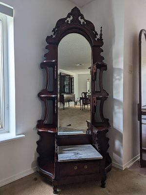 Victorian-Style Wooden HallStand With Mirror. Victorian Roccoco-style wooden hallstand featuring 