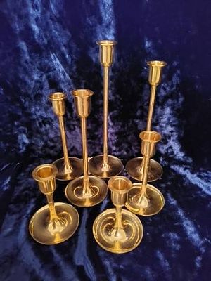 Set of Seven Solid Brass Candle Holders by Brasscrafters. Set of seven solid brass candle 