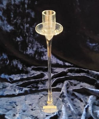 Tall Glass Candle Holder. Clear glass candle holder featuring a tall and slim design with a 