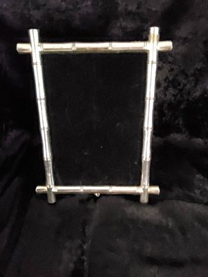 Silver-Tone, Bamboo-Style, Standing Picture Frame. A silver-tone glazed picture frame designed 