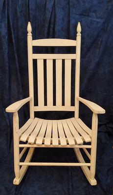 Wooden Rocking Chair Spindle Back White Finial Accents. White wooden rocking chair with a 