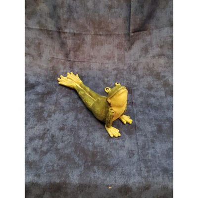 Frog Figurine Green and Yellow Stretched Pose Home Decor. Green and yellow frog figurine, likely 