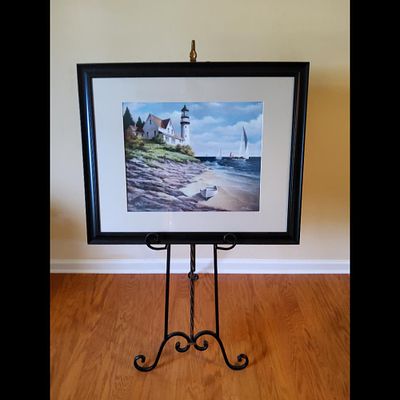 T.E.Chia Framed Lighthouse Print. Framed print by T.E. Chia presents a coastal seascape scene 